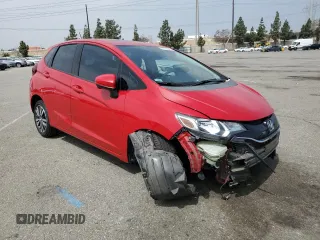 2015 Honda Fit EX-L with VIN 3HGGK5H87FM701108, listed as a Copart auction lot 55536945 with 57,519 mi miles and Salvage title. Bid and sale history available at DreamBid. Image 4.