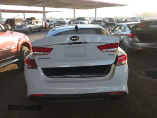 2016 Kia Optima EX with VIN 5XXGU4L30GG117411, listed as a IAAI auction lot 42034988 with 123,387 mi miles. Bid and sale history available at carsss.com. Image 16.