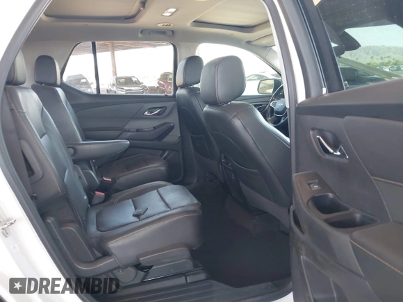 2020 Chevrolet Traverse Premier with VIN 1GNERKKW3LJ117912, listed as a IAAI auction lot 42317330 with 113,576 mi miles and . Bid and sale history available at DreamBid. Image 8.