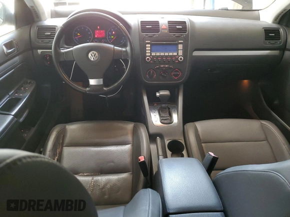 2009 Volkswagen Jetta SE z VIN 3VWRZ71K29M167800, wystawiony jako Copart lot #61451305 z przebiegiem 161 617 mil mil oraz Szkoda całkowita • Salvage title. Historia ofert i sprzedaży dostępna na DreamBid. Obrazek 8.