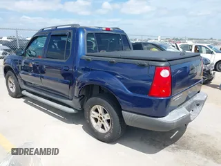 2005 Ford Explorer Sport Trac XLS z VIN 1FMZU67K05UB36386, wystawiony jako IAAI lot #42449876 z przebiegiem 161 181 mil mil oraz . Historia ofert i sprzedaży dostępna na DreamBid. Obrazek 3.