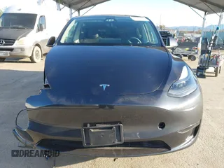 2024 Tesla Model Y with VIN 7SAYGDED5RF103983, listed as a IAAI auction lot 41933836 with 11,398 mi miles and . Bid and sale history available at DreamBid. Image 12.
