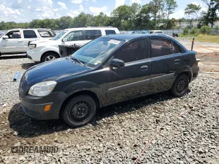 2009 Kia Rio LX with VIN KNADE223296539006, listed as a Copart auction lot 69229394 with 227,766 mi miles and Salvage Title. Bid and sale history available at DreamBid. Image 1.