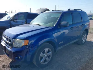 2008 Ford Escape XLT with VIN 1FMCU03188KE00812, listed as a IAAI auction lot 42015999 with 106,111 mi miles. Bid and sale history available at carsss.com. Image 2.