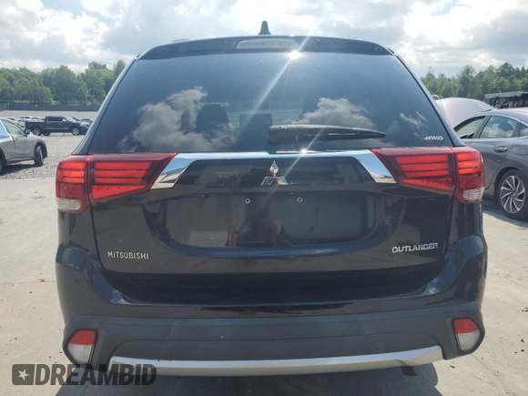 2018 Mitsubishi Outlander ES with VIN JA4AZ3A38JJ003397, listed as a Copart auction lot 65732075 with 64,768 mi miles and Salvage title. Bid and sale history available at DreamBid. Image 6.