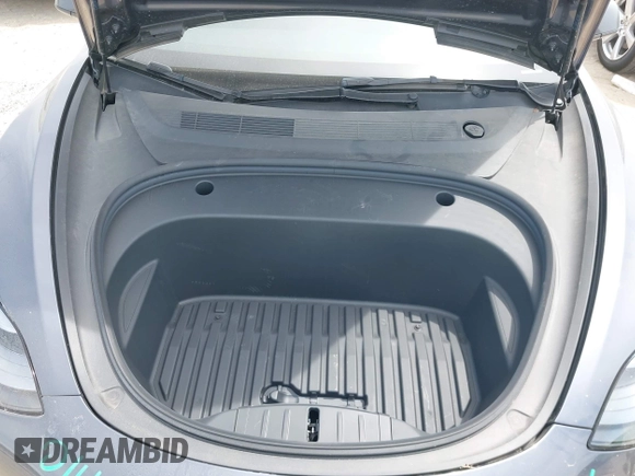 2023 Tesla Model 3 with VIN 5YJ3E1EA5PF565071, listed as a IAAI auction lot 42232719 with 15,389 mi miles and . Bid and sale history available at DreamBid. Image 10.