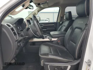 2019 Ram 1500 Laramie z VIN 1C6SRFJTXKN654141, wystawiony jako Copart lot #57014245 z przebiegiem 89 070 mil mil oraz Szkoda całkowita • Salvage title. Historia ofert i sprzedaży dostępna na DreamBid. Obrazek 7.