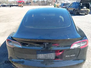 2023 Tesla Model 3 Long Range with VIN 5YJ3E1EB1PF632595, listed as a IAAI auction lot 41754131 with 8,147 mi miles and . Bid and sale history available at DreamBid. Image 16.