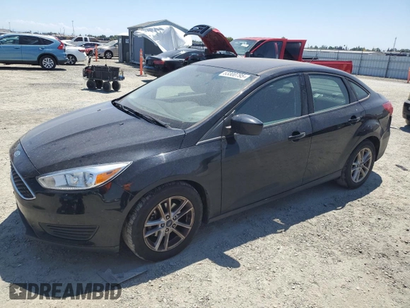 2018 Ford Focus SE with VIN 1FADP3FE8JL205699, listed as a Copart auction lot 63300795 with 128,877 mi miles and Clean title. Bid and sale history available at DreamBid. Image 1.