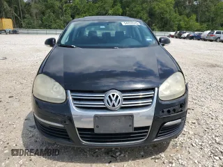 2009 Volkswagen Jetta SE z VIN 3VWRM71K49M055000, wystawiony jako Copart lot #54450045 z przebiegiem 163 451 mil mil oraz Szkoda całkowita • Salvage title. Historia ofert i sprzedaży dostępna na DreamBid. Obrazek 5.