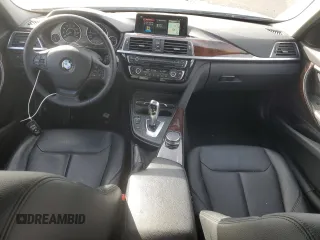 2018 BMW 3 Series 320i with VIN WBA8A9C57JAD27972, listed as a Copart auction lot 51279135 with 64,444 mi miles and Salvage title. Bid and sale history available at DreamBid. Image 8.