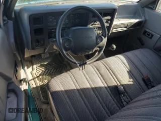 1996 Dodge Dakota z VIN 1B7GG26X9TW707044, wystawiony jako Copart lot #77101384 z przebiegiem 112 847 mil mil oraz Szkoda całkowita • Salvage title. Historia ofert i sprzedaży dostępna na DreamBid. Obrazek 8.