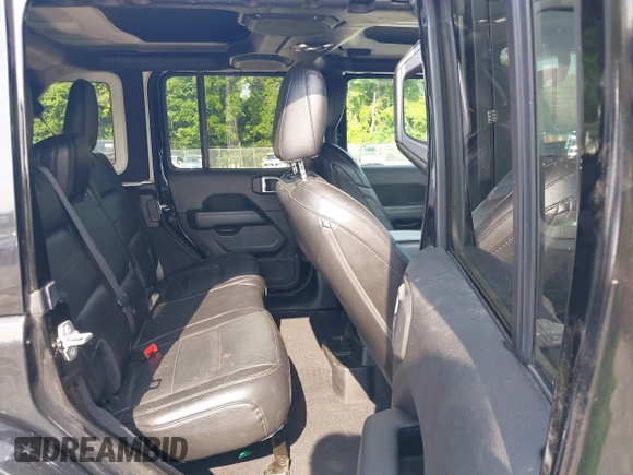 2020 Jeep Wrangler Unlimited Sahara High Altitude with VIN 1C4HJXEGXLW182581, listed as a IAAI auction lot 42612084 with 52,656 mi miles and . Bid and sale history available at DreamBid. Image 8.