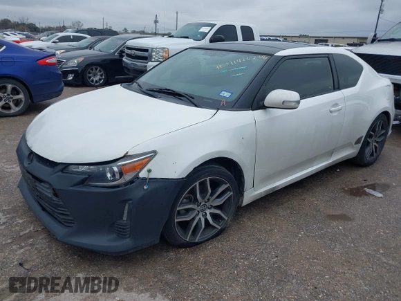 2014 Scion tC with VIN JTKJF5C73E3074035, listed as a IAAI auction lot 41426238 with 116,469 mi miles. Bid and sale history available at carsss.com. Image 2.