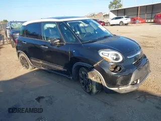 2017 FIAT 500L Trekking z VIN ZFBCFADH5HZ039470, wystawiony jako IAAI lot #40989704 z przebiegiem 117 901 mil mil oraz . Historia ofert i sprzedaży dostępna na DreamBid. Obrazek 1.