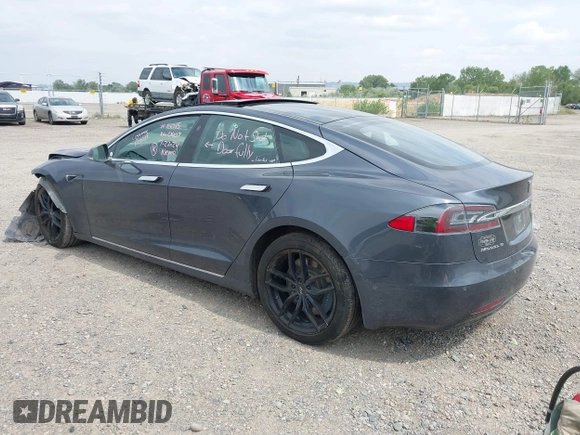 2019 Tesla Model S 75D with VIN 5YJSA1E22KF300407, listed as a IAAI auction lot 40034839 with 59,178 mi miles and . Bid and sale history available at DreamBid. Image 3.