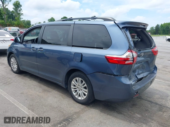 2015 Toyota Sienna XLE with VIN 5TDYK3DC3FS676919, listed as a IAAI auction lot 42475307 with 99,574 mi miles and . Bid and sale history available at DreamBid. Image 3.