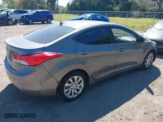 2013 Hyundai Elantra GLS PZEV with VIN 5NPDH4AE1DH213138, listed as a IAAI auction lot 41754216 with 213,771 mi miles. Bid and sale history available at carsss.com. Image 4.