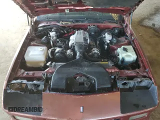 1989 Chevrolet Camaro z VIN 1G1FP21F7KL137015, wystawiony jako Copart lot #46108305 z przebiegiem 78 714 mil mil oraz Szkoda całkowita • Salvage title. Historia ofert i sprzedaży dostępna na DreamBid. Obrazek 11.