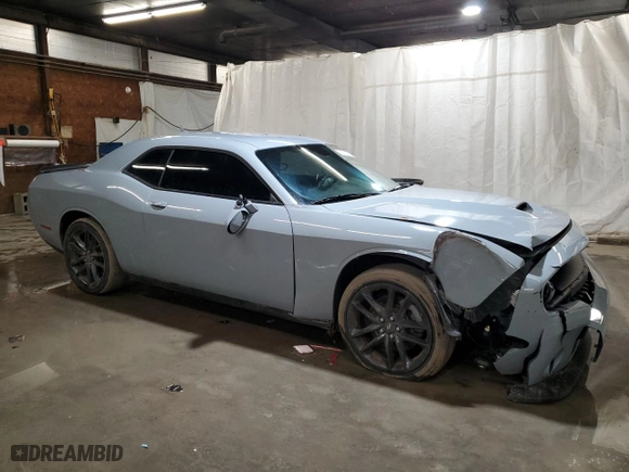 2021 Dodge Challenger GT with VIN 2C3CDZKG4MH677316, listed as a Copart auction lot 86614104 with 60,283 mi miles and Salvage Title. Bid and sale history available at carsss.com. Image 4.