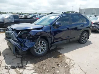 2024 Toyota RAV4 Hybrid XLE Premium with VIN 4T3B6RFV6RU146619, listed as a IAAI auction lot 42060476 with 22,594 mi miles and . Bid and sale history available at DreamBid. Image 2.