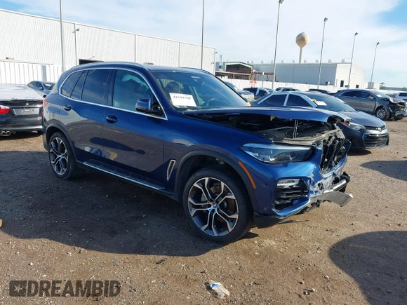 2021 BMW X5 sDrive40i with VIN 5UXCR4C0XM9G29080, listed as a IAAI auction lot 41340380 with 85,403 mi miles. Bid and sale history available at carsss.com. Image 1.
