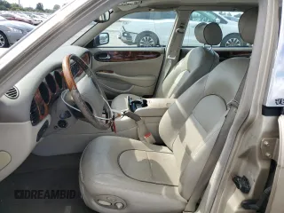 1999 Jaguar XJ z VIN SAJKX6048XC849376, wystawiony jako Copart lot #70538064 z przebiegiem 122 891 mil mil oraz Szkoda całkowita • Salvage title. Historia ofert i sprzedaży dostępna na DreamBid. Obrazek 7.