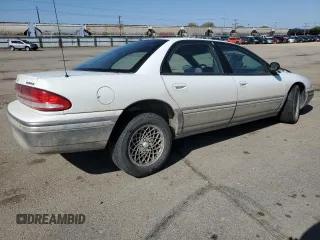 1993 Chrysler Concorde z VIN 2C3EL56T1PH613475, wystawiony jako Copart lot #54610735 z przebiegiem 163 913 mil mil oraz Szkody całkowita. Historia ofert i sprzedaży dostępna na DreamBid. Obrazek 3.