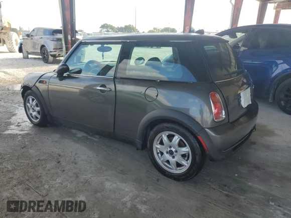 2006 MINI Hardtop with VIN WMWRC33526TK15620, listed as a Copart auction lot 54130715 with 116,981 mi miles and Salvage title. Bid and sale history available at DreamBid. Image 2.