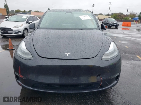 2024 Tesla Model Y Long Range with VIN 7SAYGDEE5RA241433, listed as a IAAI auction lot 41569277 with 7,490 mi miles. Bid and sale history available at carsss.com. Image 11.
