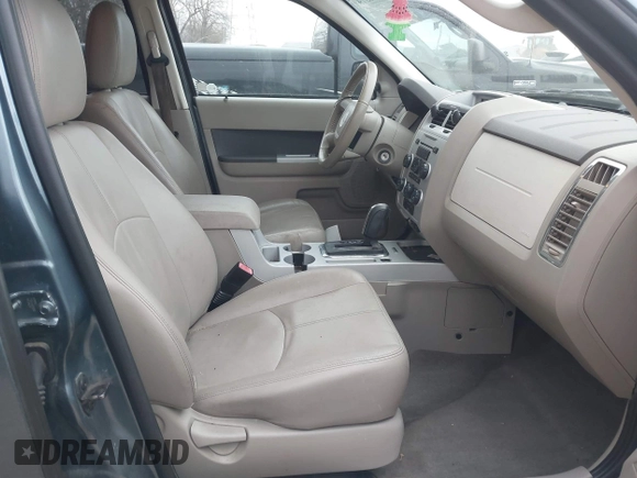 2010 Mercury Mariner Premier with VIN 4M2CN9H75AKJ06979, listed as a IAAI auction lot 41156374 with 149,784 mi miles and . Bid and sale history available at DreamBid. Image 5.
