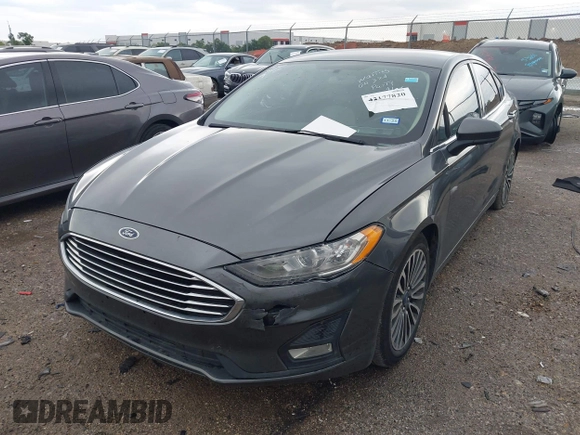2020 Ford Fusion SE z VIN 3FA6P0HD5LR198744, wystawiony jako IAAI lot #42177820 z przebiegiem 97 520 mil mil oraz . Historia ofert i sprzedaży dostępna na DreamBid. Obrazek 18.