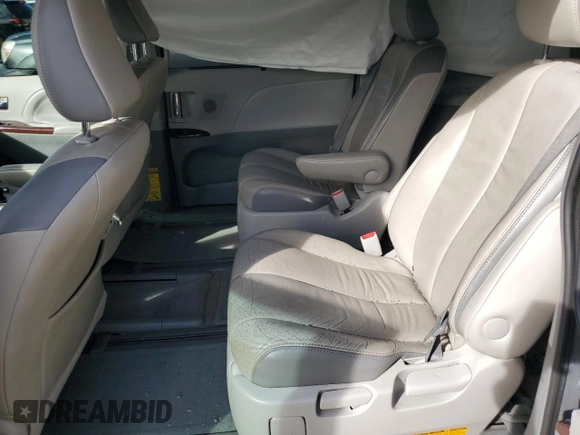 2013 Toyota Sienna XLE AAS with VIN 5TDYK3DC1DS318277, listed as a Copart auction lot 54156935 with 218,564 mi miles and Salvage title. Bid and sale history available at DreamBid. Image 11.
