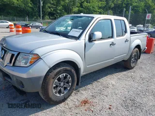 2018 Nissan Frontier SV with VIN 1N6AD0EVXJN743148, listed as a IAAI auction lot 42398810 with 82,286 mi miles and . Bid and sale history available at DreamBid. Image 2.