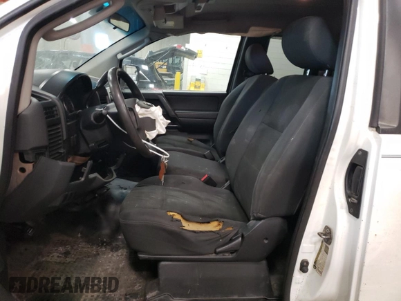 2010 Nissan Titan with VIN 1N6BA0CJ1AN310380, listed as a Copart auction lot 42785105 with 111,663 mi miles and Salvage title. Bid and sale history available at DreamBid. Image 7.