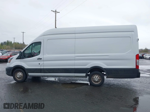 2023 Ford Transit Cargo with VIN 1FTBR3U89PKA09391, listed as a IAAI auction lot 41993662 with 36,147 mi miles and . Bid and sale history available at DreamBid. Image 14.