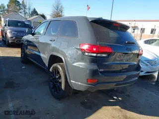 2018 Jeep Grand Cherokee Laredo E with VIN 1C4RJFAGXJC147400, listed as a IAAI auction lot 41358662 with 97,184 mi miles. Bid and sale history available at carsss.com. Image 3.