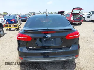 2016 Ford Focus Titanium z VIN 1FADP3J20GL310467, wystawiony jako IAAI lot #42478332 z przebiegiem 214 479 mil mil oraz . Historia ofert i sprzedaży dostępna na DreamBid. Obrazek 16.