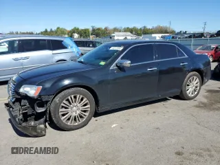 2013 Chrysler 300 C with VIN 2C3CCAKG0DH683117, listed as a Copart auction lot 74812334 with 187,308 mi miles and Salvage Title. Bid and sale history available at DreamBid. Image 1.