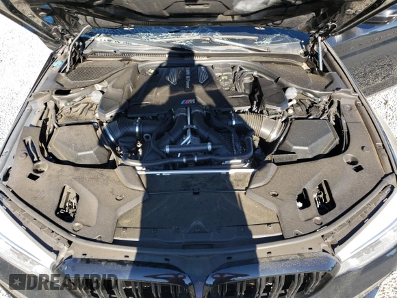 2018 BMW M5 z VIN WBSJF0C57JB283361, wystawiony jako Copart lot #65352164 z przebiegiem Nie podano mil oraz Szkoda całkowita • Salvage title. Historia ofert i sprzedaży dostępna na DreamBid. Obrazek 11.
