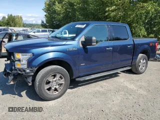 2015 Ford F-150 XLT with VIN 1FTEW1EP7FKE12574, listed as a Copart auction lot 59519985 with 133,337 mi miles and Salvage title. Bid and sale history available at DreamBid. Image 1.