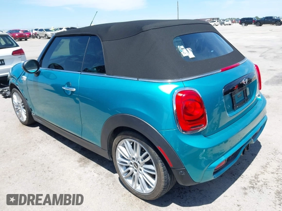 2017 MINI Convertible Cooper S z VIN WMWWG9C30H3C80917, wystawiony jako IAAI lot #42227320 z przebiegiem 38 490 mil mil oraz . Historia ofert i sprzedaży dostępna na DreamBid. Obrazek 3.