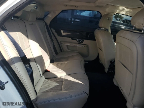 2014 Jaguar XJ with VIN SAJWA2GZ0E8V59422, listed as a Copart auction lot 74213414 with 96,314 mi miles and Non Repairable. Bid and sale history available at carsss.com. Image 10.