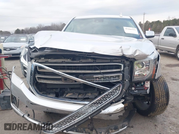 2019 GMC Yukon XL SLT with VIN 1GKS1GKC8KR383694, listed as a IAAI auction lot 41466213 with 128,368 mi miles. Bid and sale history available at carsss.com. Image 6.