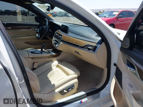 2016 BMW 7 Series 740i с VIN WBA7E2C50GG504050, выставлен на аукционе IAAI как лот 42498517 с пробегом 79 427 миль миль и . История ставок и продаж доступна на DreamBid. Изображение 5.