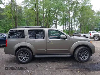 2005 Nissan Pathfinder SE z VIN 5N1AR18WX5C748572, wystawiony jako IAAI lot #42180475 z przebiegiem 291 301 mil mil oraz . Historia ofert i sprzedaży dostępna na DreamBid. Obrazek 13.