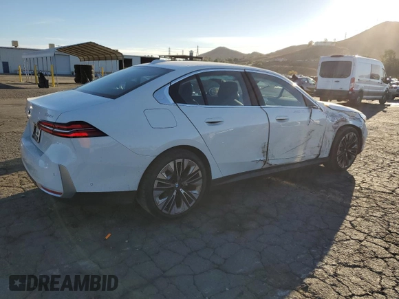 2024 BMW 5 Series 530i with VIN WBA43FJ0XRCS05943, listed as a Copart auction lot 87277084 with 4,924 mi miles and Salvage Title. Bid and sale history available at carsss.com. Image 3.