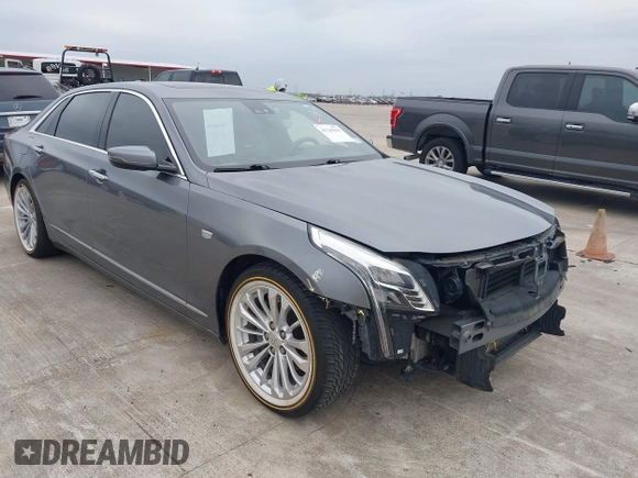 2018 Cadillac CT6 Luxury RWD z VIN 1G6KC5RX4JU159789, wystawiony jako IAAI lot #41145010 z przebiegiem 73 811 mil mil oraz . Historia ofert i sprzedaży dostępna na DreamBid. Obrazek 1.