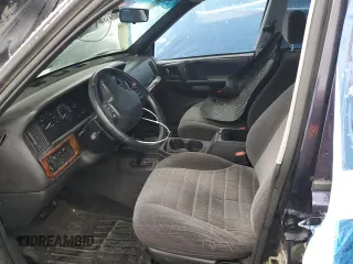 1997 Jeep Grand Cherokee Laredo with VIN 1J4GZ58Y0VC547880, listed as a Copart auction lot 79866684 with 0 mi miles and Salvage Title. Bid and sale history available at carsss.com. Image 7.