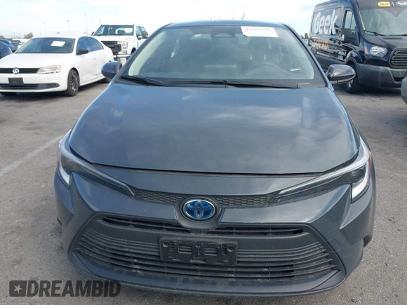2023 Toyota Corolla Hybrid LE with VIN JTDBCMFE8P3023738, listed as a IAAI auction lot 41765597 with 59,938 mi miles. Bid and sale history available at carsss.com. Image 12.